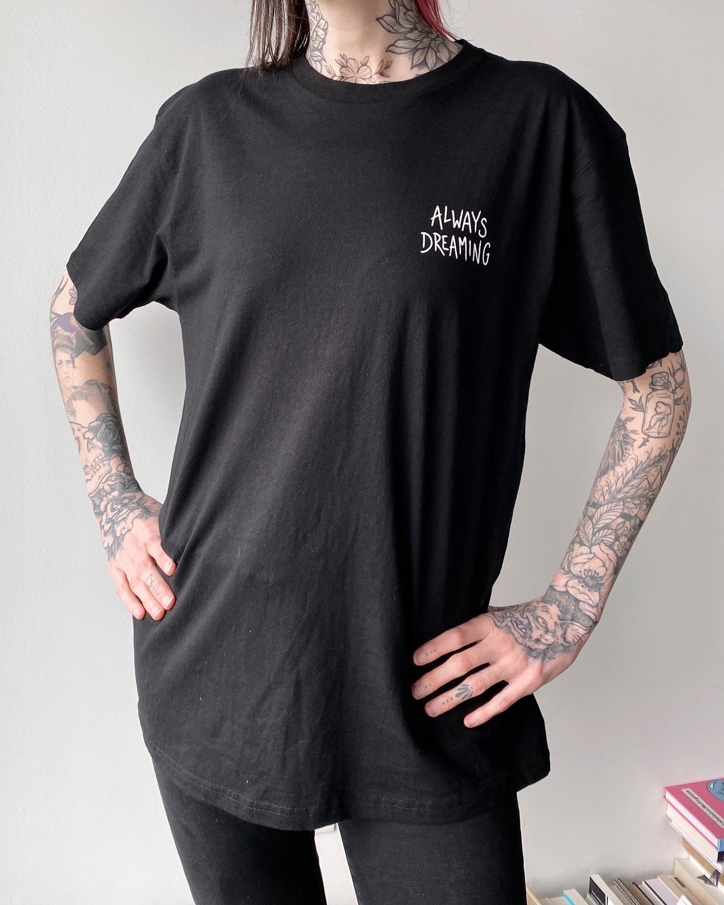 Always dreaming front tshirt design in black line work and shading, illustrated by female floral tattoo artist Lu Loram Martin, Toronto, Canada