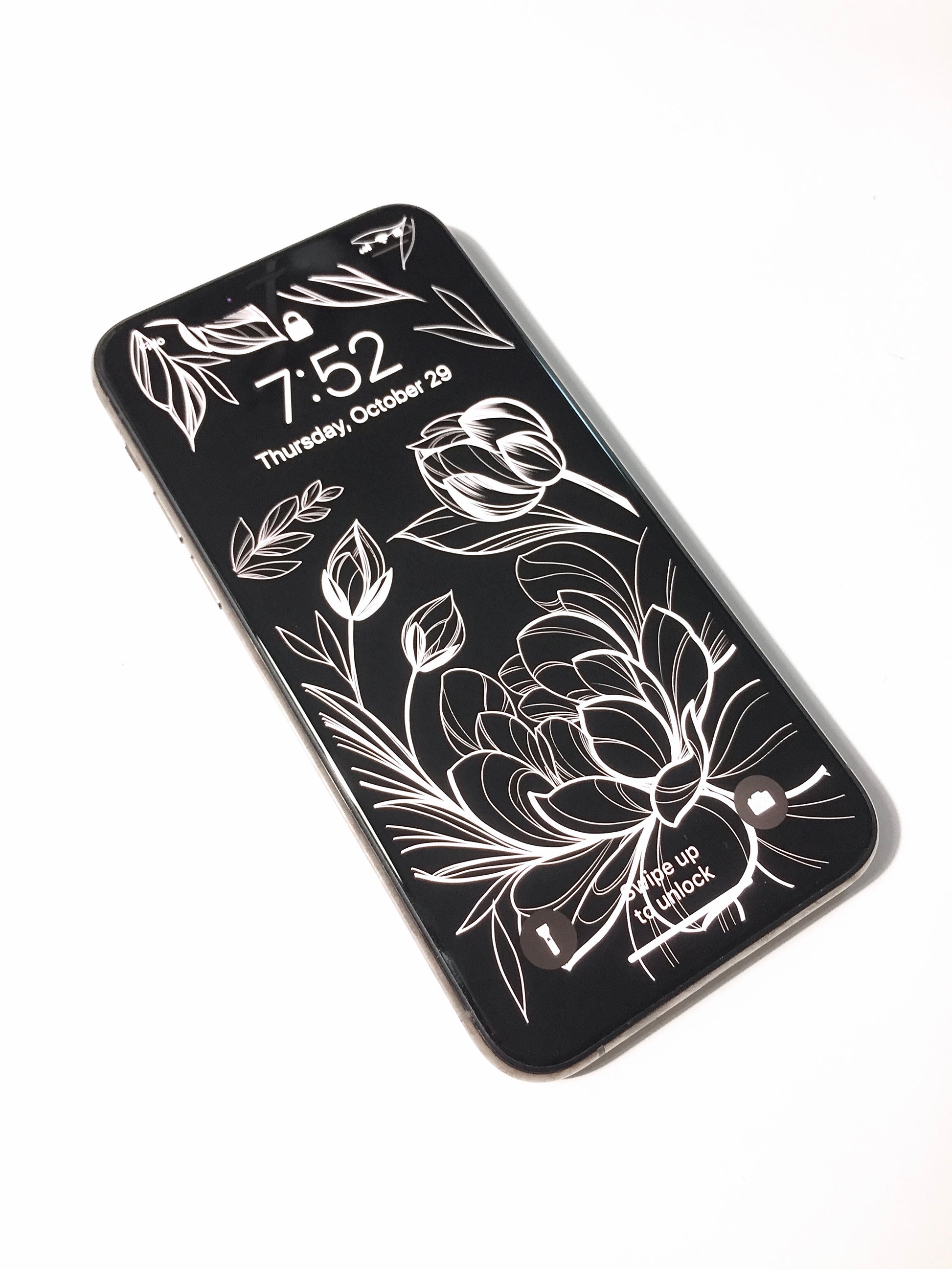 fineline lotus flower illustration phone background, white florals on black, by Lu Loram-Martin. Toronto tattoo artist and illustrator
